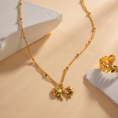 Elara Gold Bow Necklace